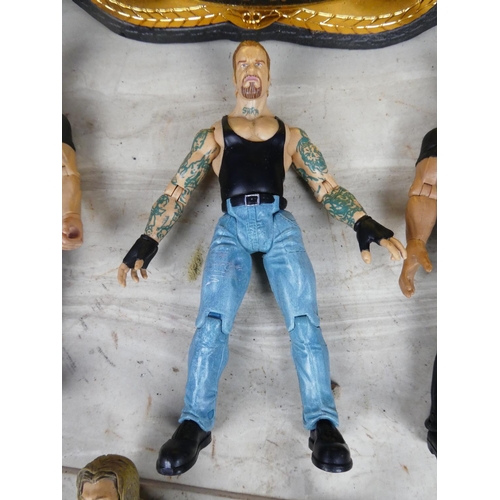 439 - A large lot of WWFE wresting figures and more.