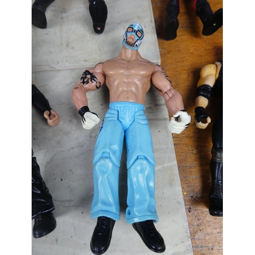 439 - A large lot of WWFE wresting figures and more.