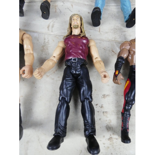 439 - A large lot of WWFE wresting figures and more.