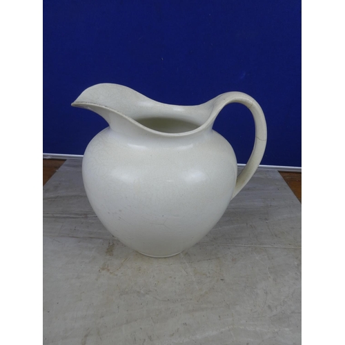 450 - A large ceramic jug.  Approx 26cm.