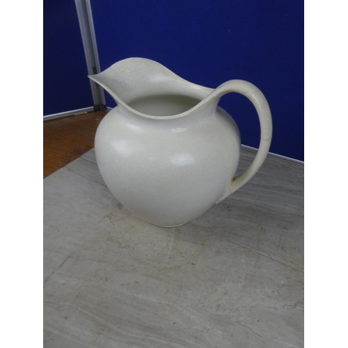 450 - A large ceramic jug.  Approx 26cm.