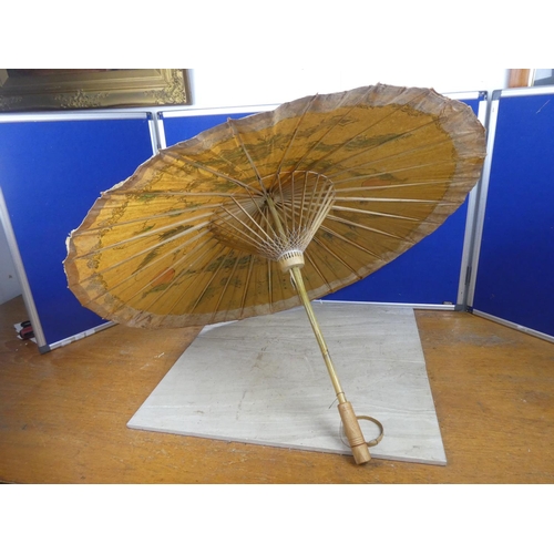 452 - A decorative paper parasol.