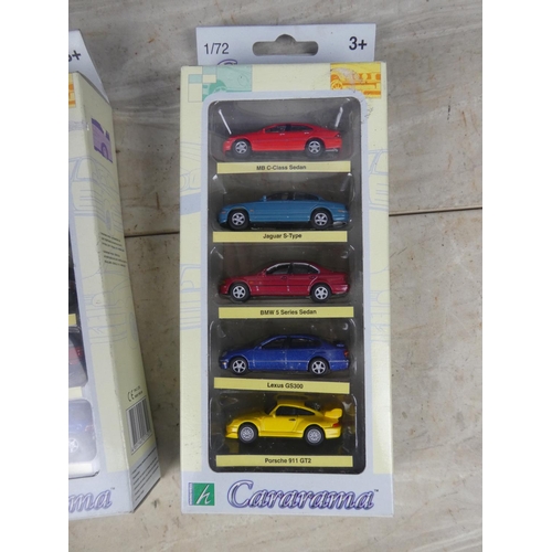 457 - Two boxed sets of five collectors cars.