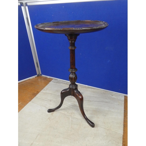 475 - A stunning small mahogany wine table on tripod base.  Approx 49cm.