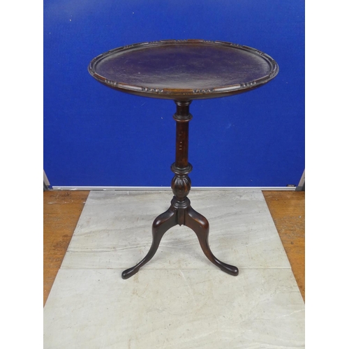 475 - A stunning small mahogany wine table on tripod base.  Approx 49cm.