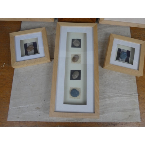 479 - A lot of framed pebble pictures.