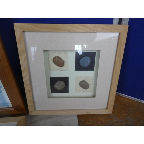 479 - A lot of framed pebble pictures.