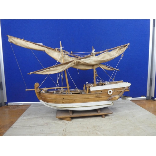 484 - A model wooden fishing boat.  Approx 52cm.