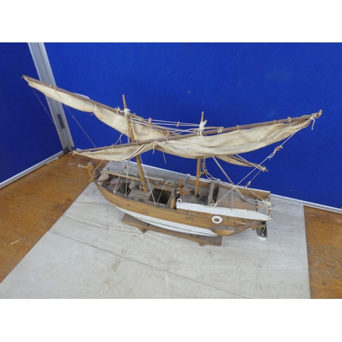 484 - A model wooden fishing boat.  Approx 52cm.