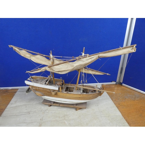 484 - A model wooden fishing boat.  Approx 52cm.