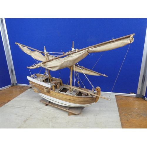 484 - A model wooden fishing boat.  Approx 52cm.