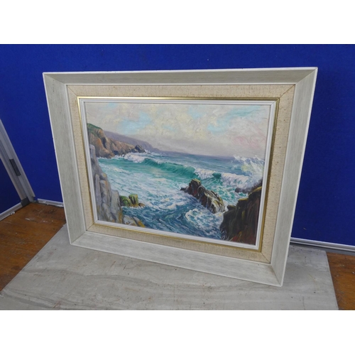 489 - A vintage framed oil painting on board of a costal scene signed.  Approx 44x36cm.