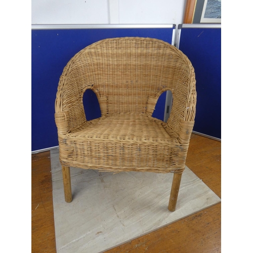 496 - A small rattan armchair.  Approx 55cm.