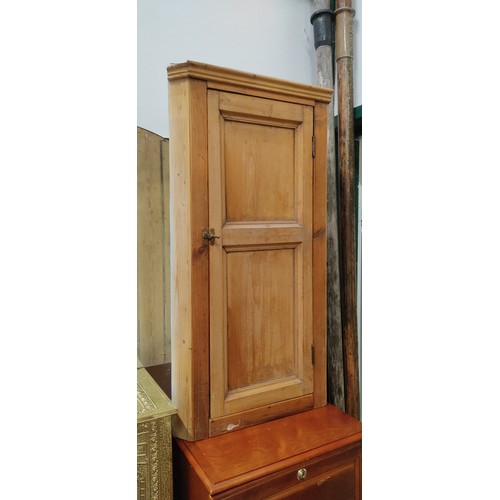 74 - A vintage pine wall hanging corner cabinet.  Approx 45x86x26cm.