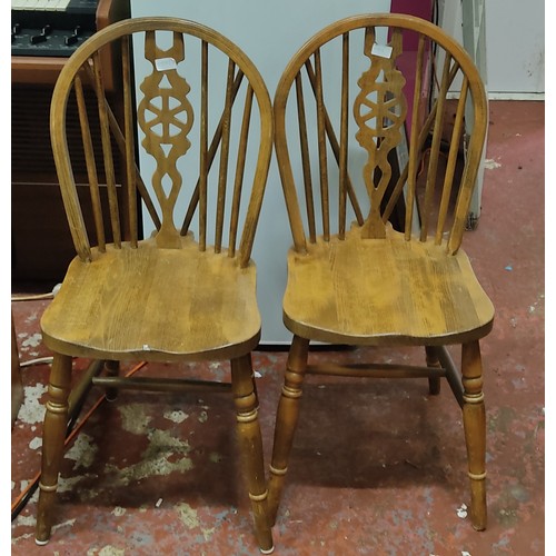 245 - Two vintage kitchen chairs.