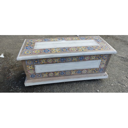 246 - A stunning handmade chest with decorative carvings and paint job.