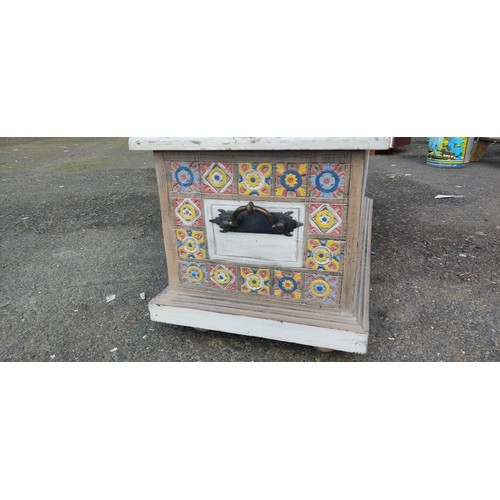 246 - A stunning handmade chest with decorative carvings and paint job.