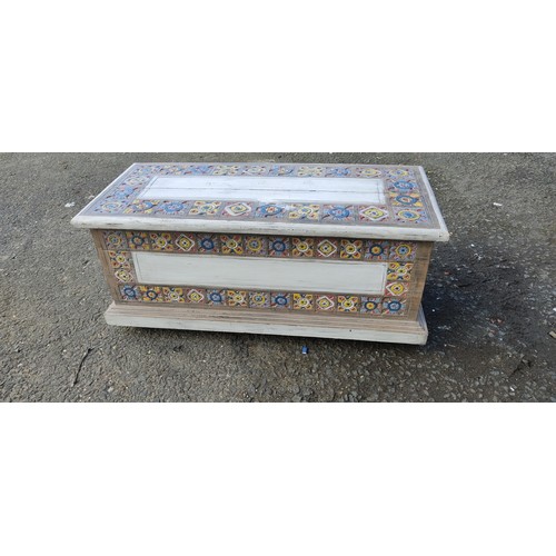 246 - A stunning handmade chest with decorative carvings and paint job.