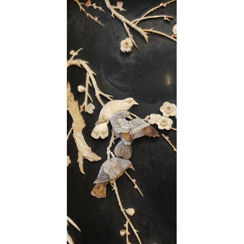 267 - A Japanese style inlaid lacquer panel, decorated with bone and pearl. (A/F)  Approx 50x75cm.