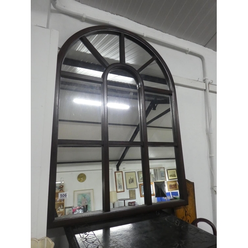 506 - A large wooden framed arch top mirror.  Approx 74x104cm.