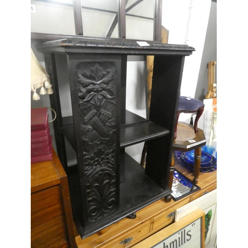 511 - A rare antique painted oak revolving bookstand with hand carved 'Green Man' panels.