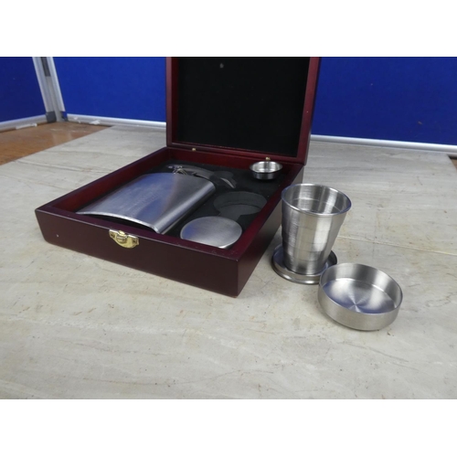 515 - A boxed hip flask set.