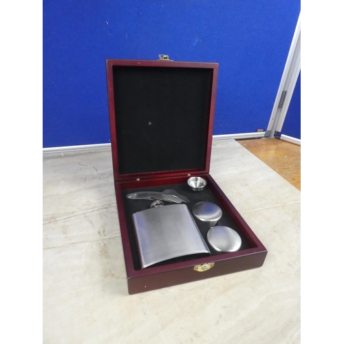 515 - A boxed hip flask set.