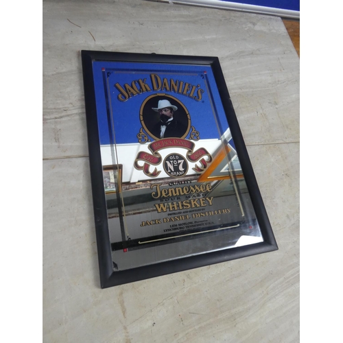 519 - A Jack Daniels mirror.  Approx 22x32cm.