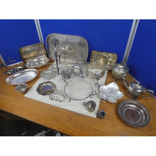 542 - A large assortment of silver plate and pewter ware.