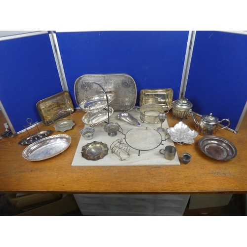 542 - A large assortment of silver plate and pewter ware.