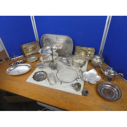 542 - A large assortment of silver plate and pewter ware.