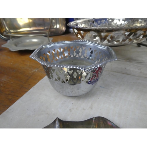 542 - A large assortment of silver plate and pewter ware.