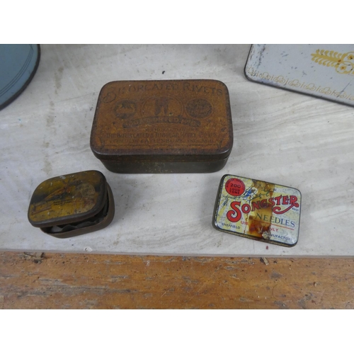 544 - A collection of vintage tins to include J & J Colman Ltd mustard tin decorated with warships, a Gall... 