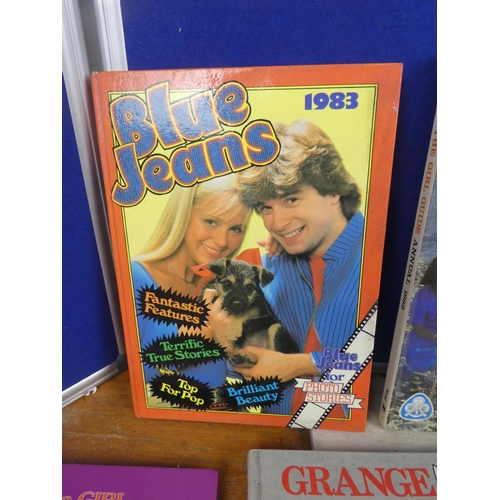 546 - A collection of vintage annuals and books to include Grange Hill, Blue Jeans and more.