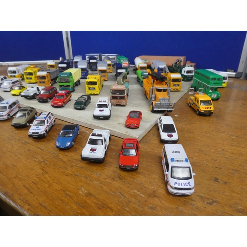 547 - A large box of assorted toy vehicles.