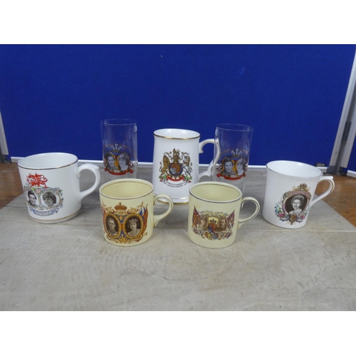 560 - A collection of commemorative ceramics and glasses.