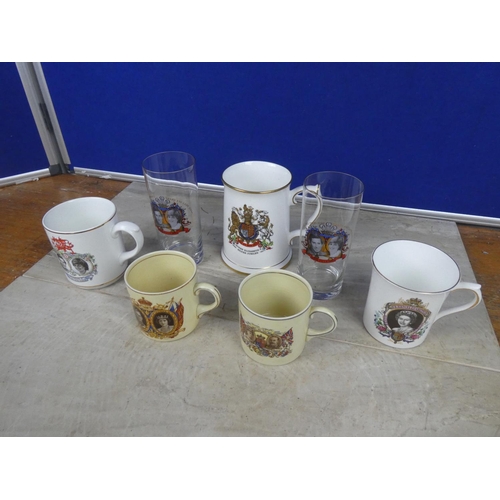 560 - A collection of commemorative ceramics and glasses.