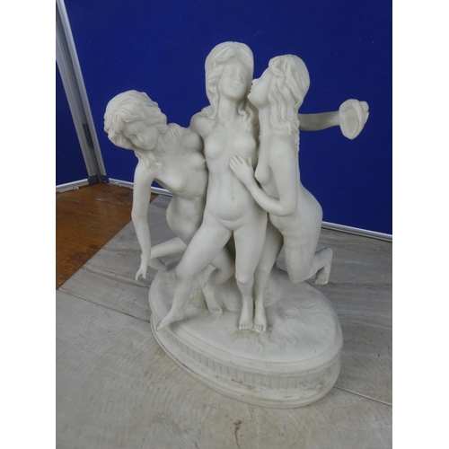 563 - An ornamental statue.  Approx 35cm.