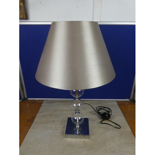 564 - A modern table lamp and shade.  Approx 64cm.