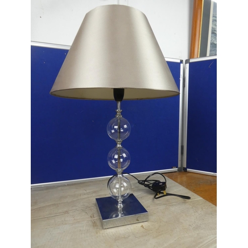 564 - A modern table lamp and shade.  Approx 64cm.