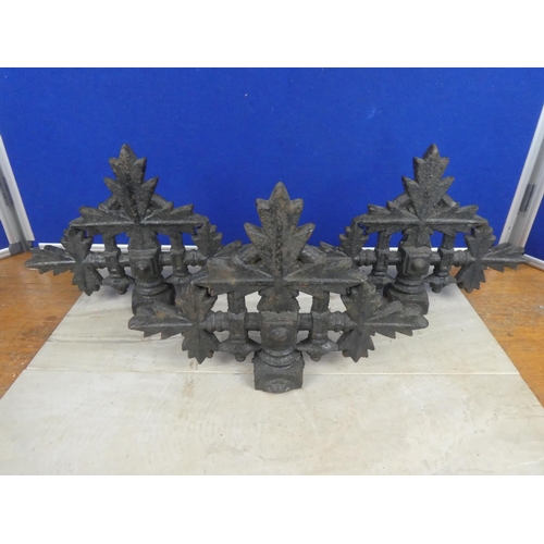 579 - Three antique cast iron post tops.