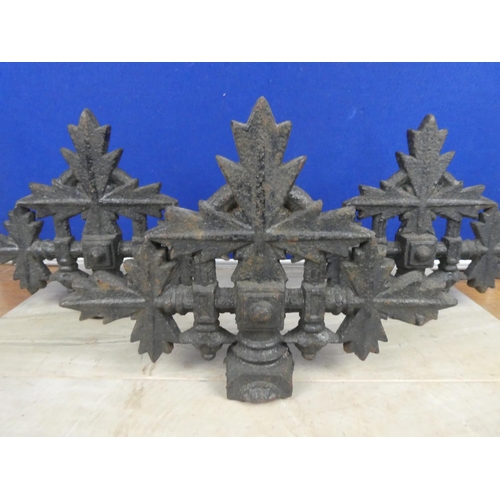 579 - Three antique cast iron post tops.