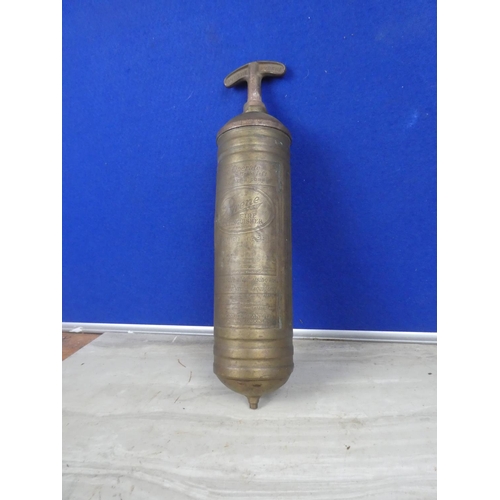 582 - An antique brass Pyrene fire extingusher.