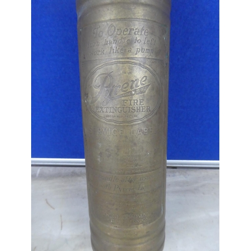 582 - An antique brass Pyrene fire extingusher.