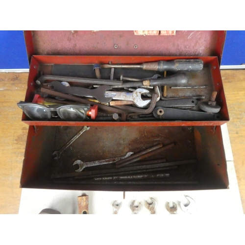 585 - A vintage tool box and contents.