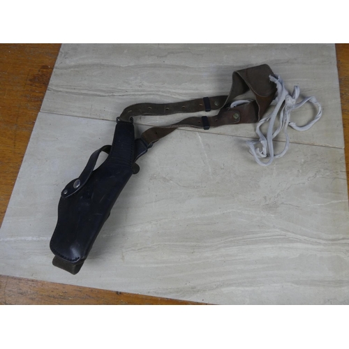 586 - A vintage Highmark leather gun holster.