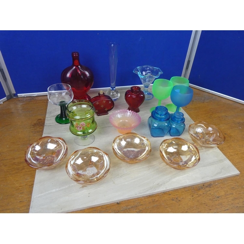 587 - A collection of assorted coloured glass ware and more.