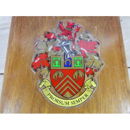 588 - A wooden wall plaque 'Prorsum Semper'.  Approx 15x20cm.