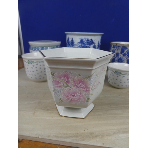 595 - A hand painted blue and white patterned plant pot with oriental design and more.