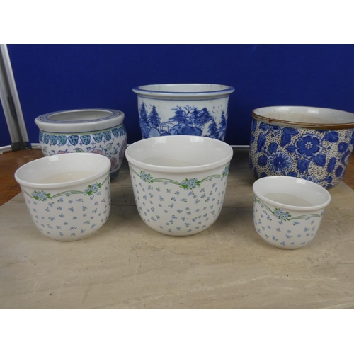 595 - A hand painted blue and white patterned plant pot with oriental design and more.